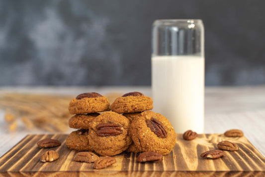 keto pecan cookies on a wood board